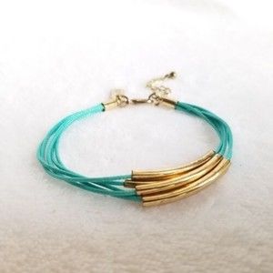 Aero 1987 gold tube beads and turquoise cord Bracelet